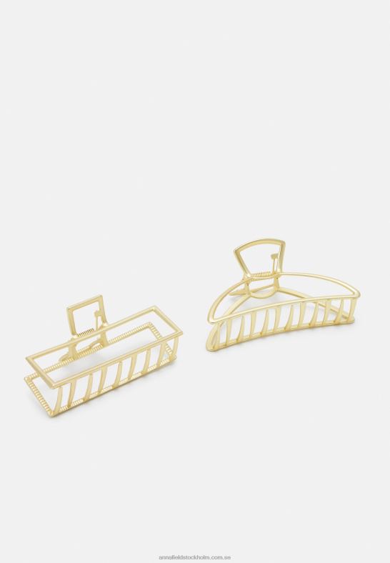2_pack_harstylingtillbehor_guldfargat_anna_field_42bf62669_kvinnor.jpg 2-pack hårstylingtillbehör guldfärgat Anna Field 42BF62669 kvinnor - Bild 1