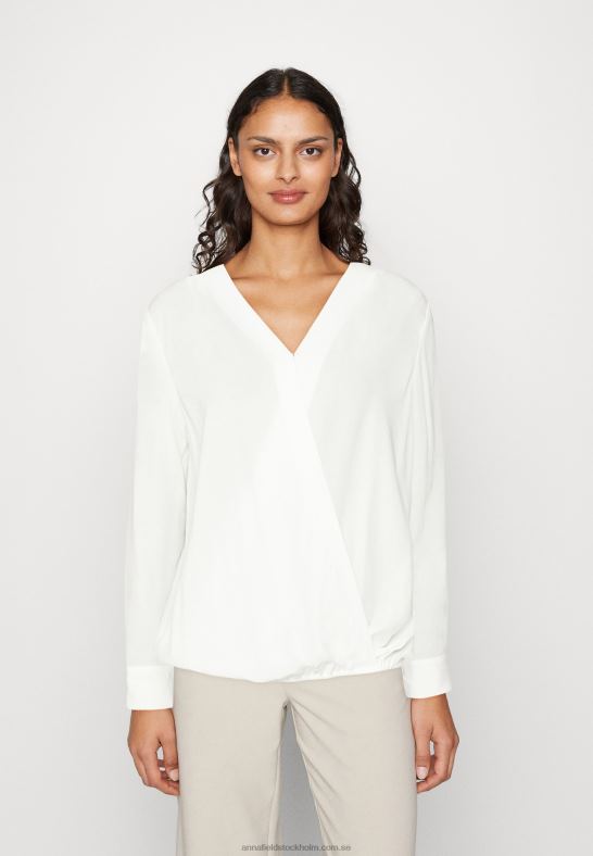 blus_benvit_anna_field_42bf6686_kvinnor.jpg blus benvit Anna Field 42BF6686 kvinnor - Bild 1